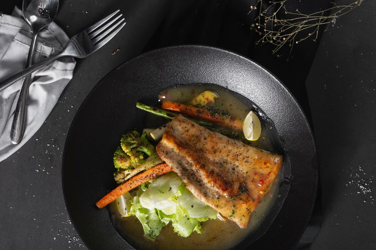 A simple home-cooked meal of salmon, roasted vegetables and grains