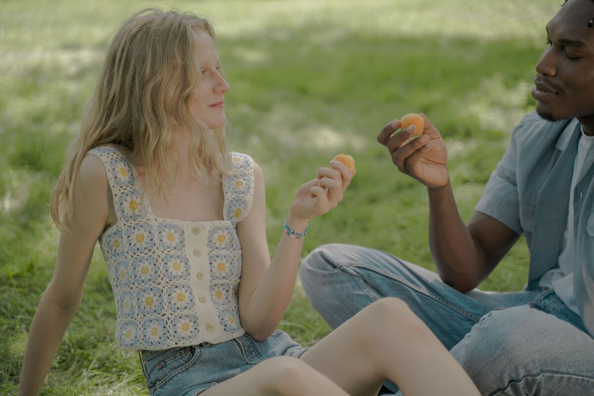 Two hands reaching toward each other, a moment of gentle connection